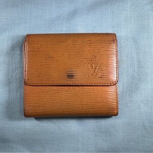 AUTHENTIC Louis Vuitton wallet. Tassel yellow.